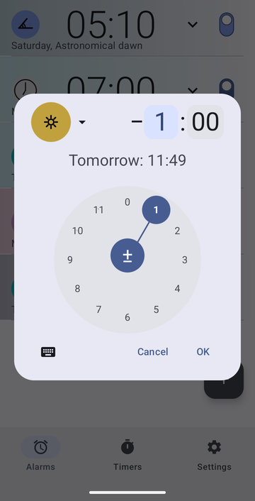 Risetime's create-alarm dialog open over the alarm list: the Noon anchor chip, an offset of minus 1 hour and 00 minutes with the hours field selected, and the line Tomorrow: 11:49. A circular hours dial with 1 selected fills the lower half, with Cancel and OK beneath it.