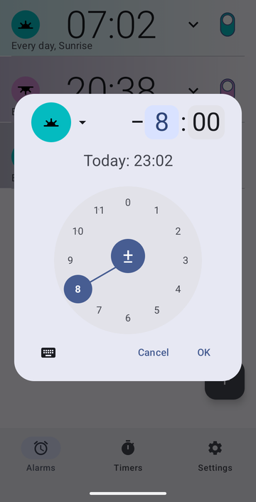 The new-alarm dialog set on Sunrise with an offset of eight hours before, the hours dial on 8 and the minutes on 00, and the line Today: 23:02.